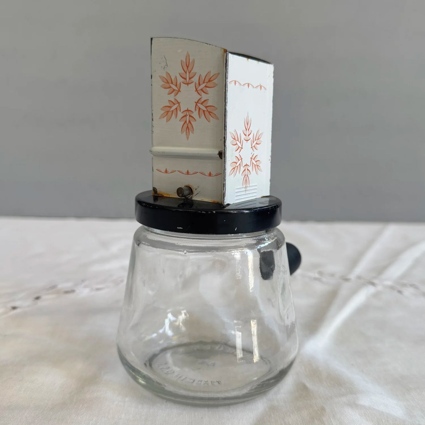 1950's 'Androck' Orange Snowflake Nut Grinder