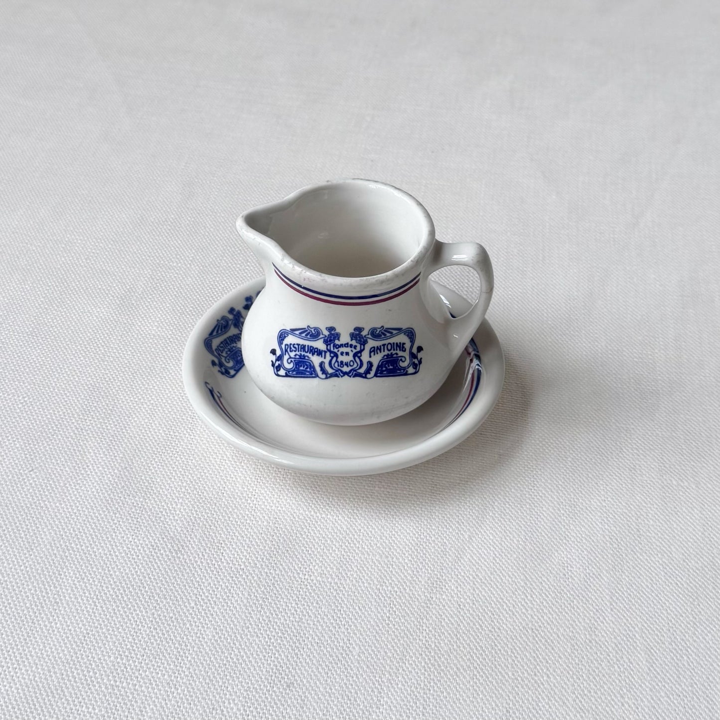 Antoines Restaurant Creamer & Saucer