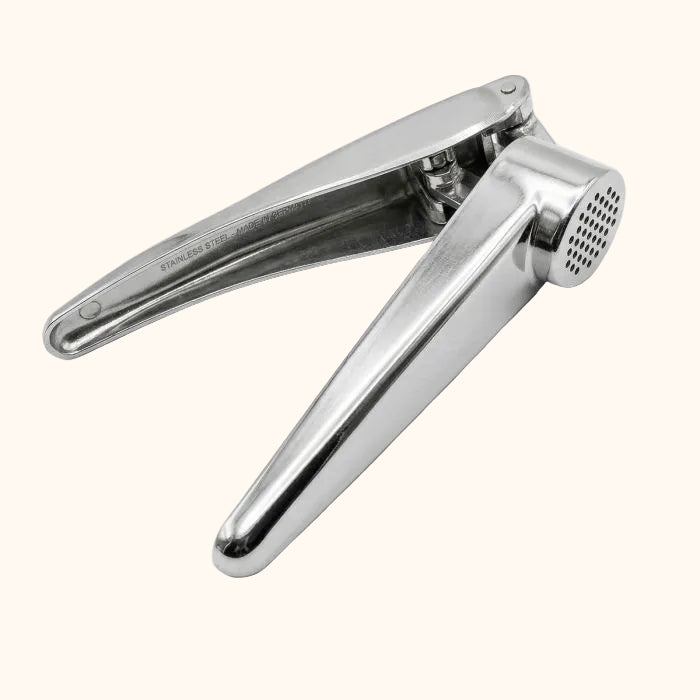 New - Garlic Press