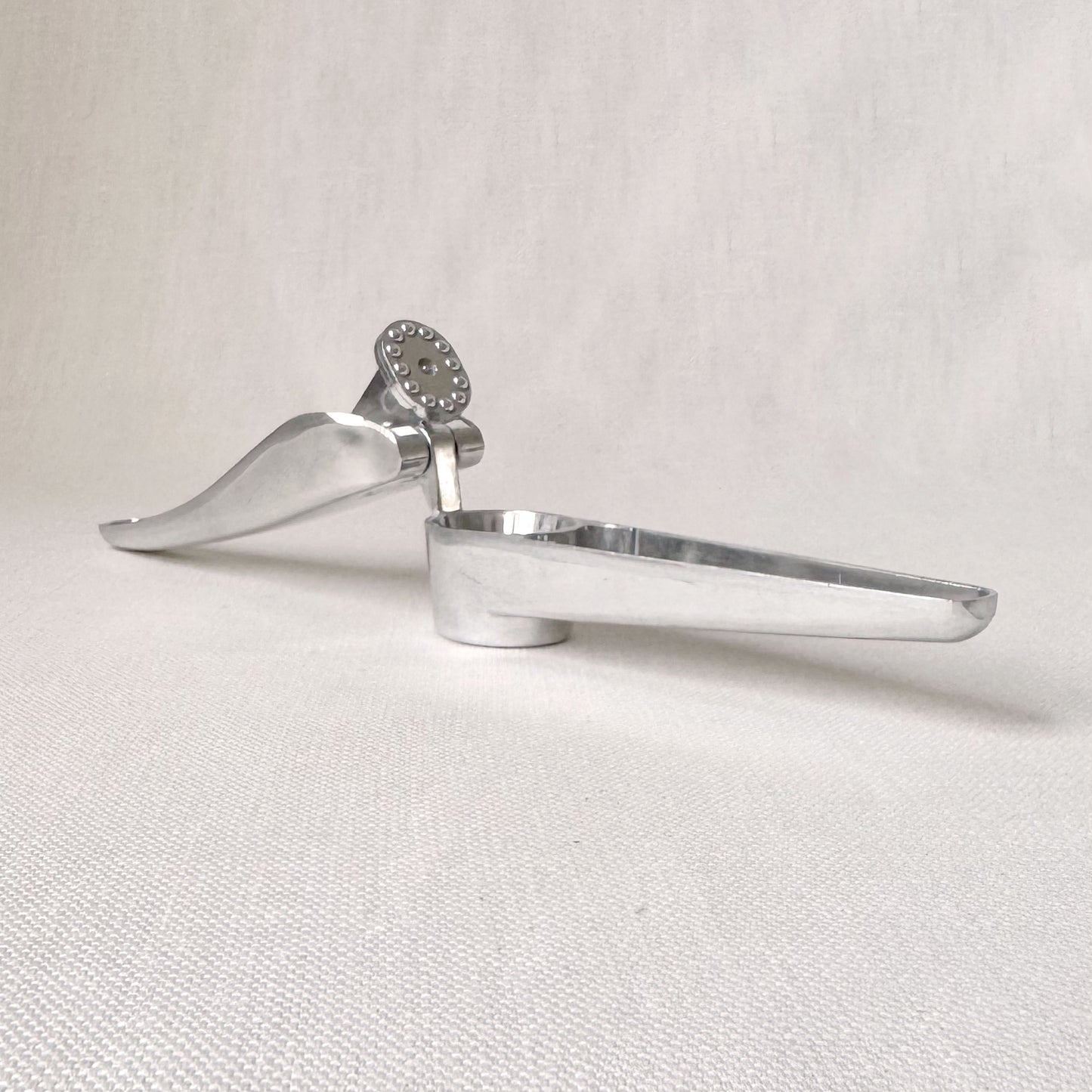 New - Garlic Press