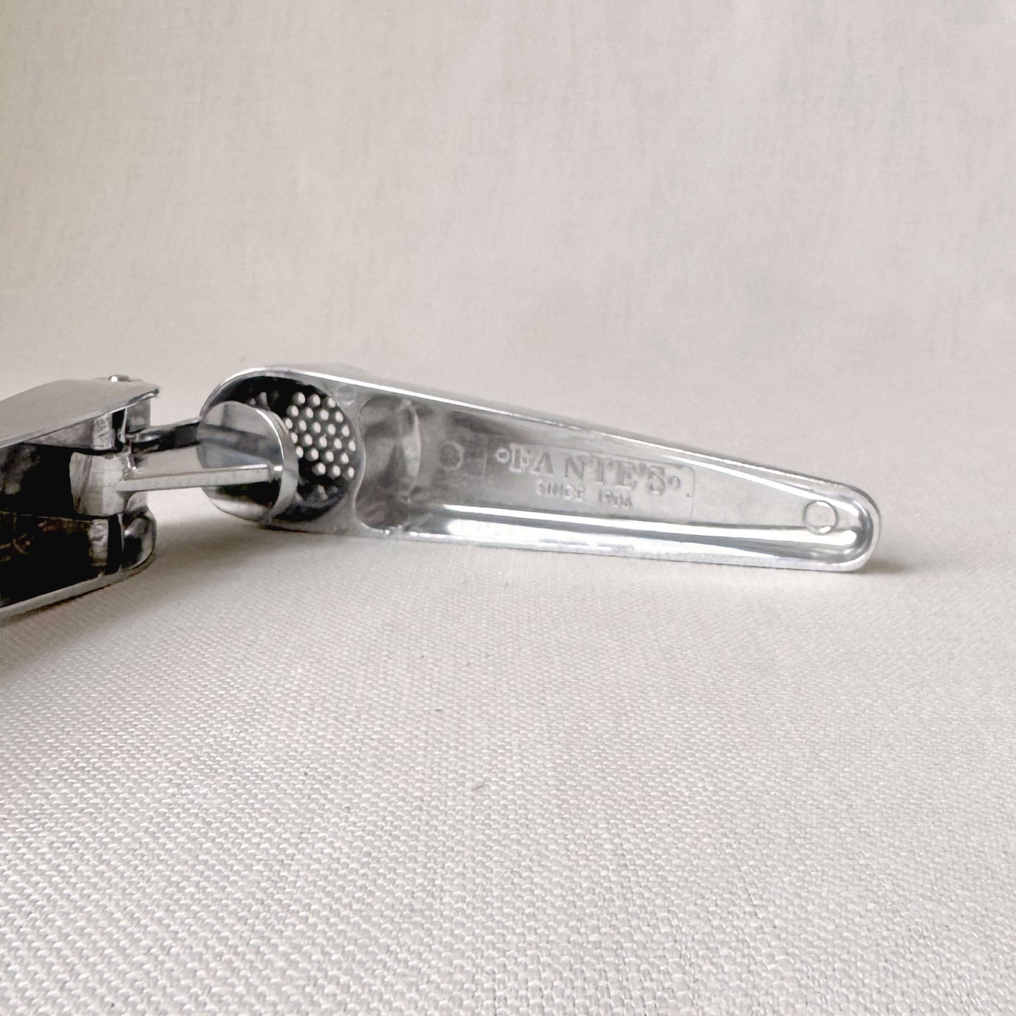 New - Garlic Press