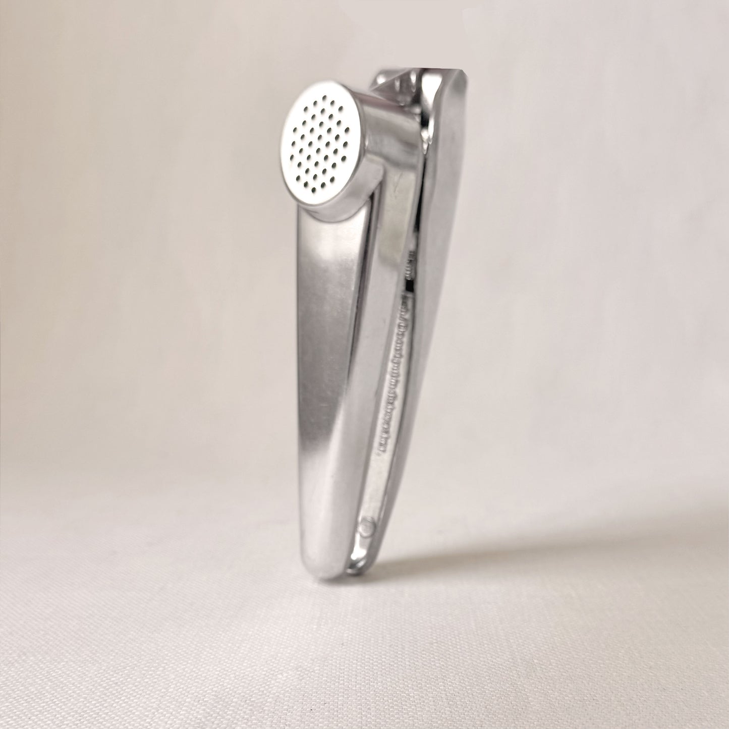 New - Garlic Press