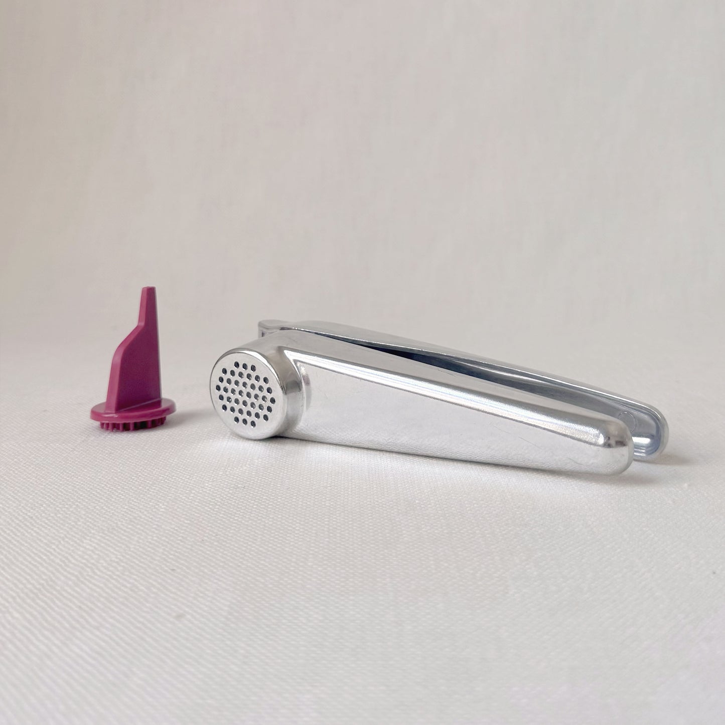 New - Garlic Press