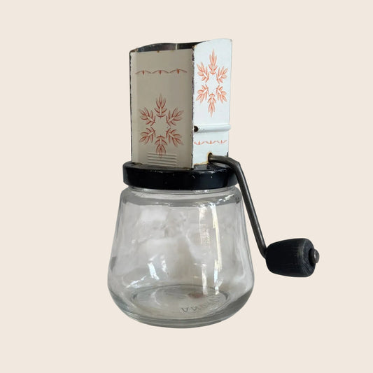 1950's 'Androck' Orange Snowflake Nut Grinder