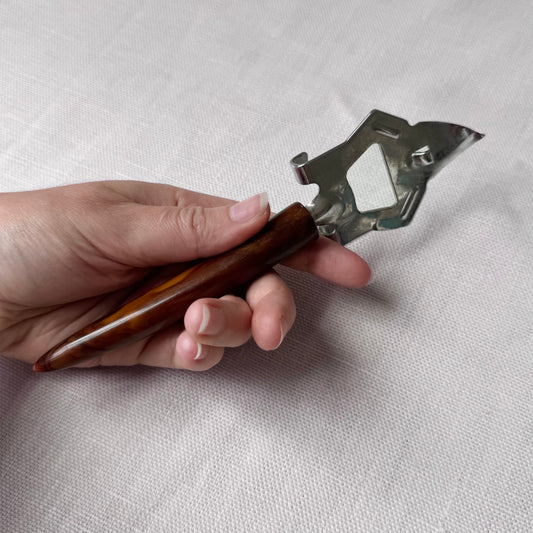 MCM Bakelite Swirl Handle Bottle Opener