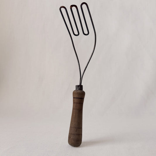 Antique Angled Masher
